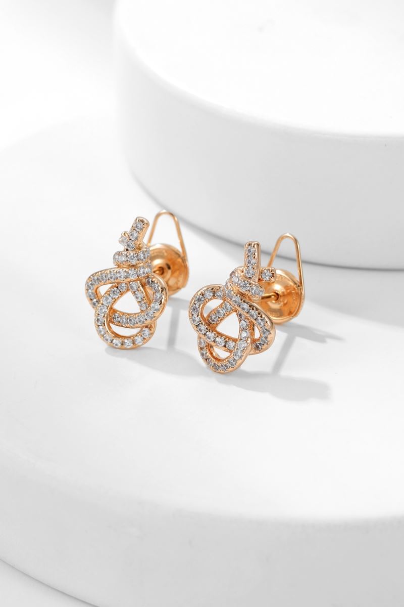 T*f*ny earrings